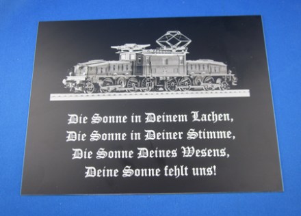 Laser Fotogravur auf schwarz eloxiertem Aluminium